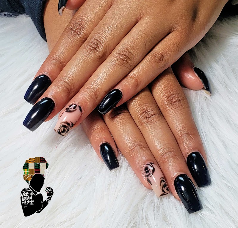 Stiletto nail shape with intricate hand-painted design